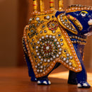 Hand carved, trunk up metal elephant with colourful inlay work