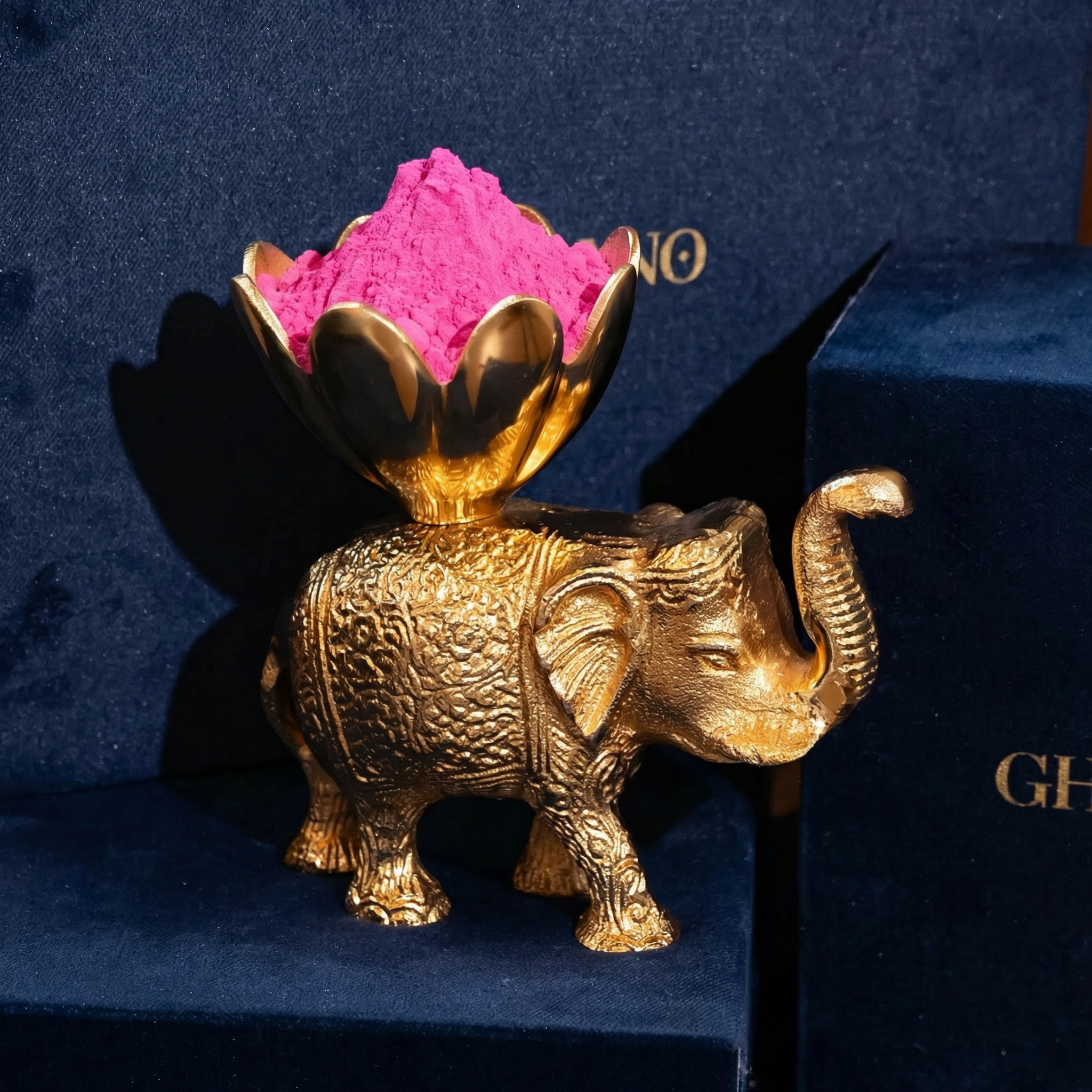 Gold-Plated Elephant with a Flower-Shaped Bowl on Its Back