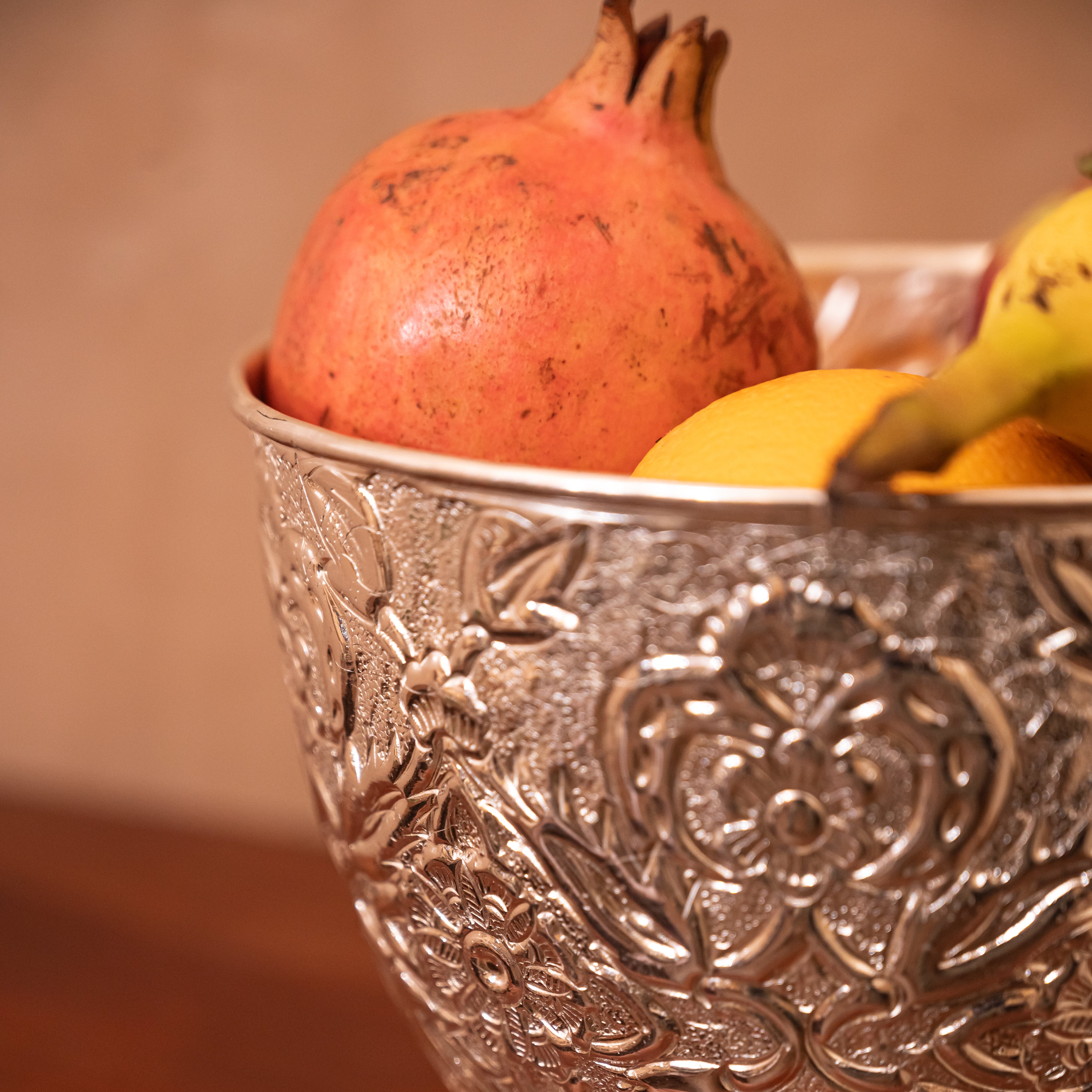 Long Urli Fruit Bowl Supported by Elephant Stands
